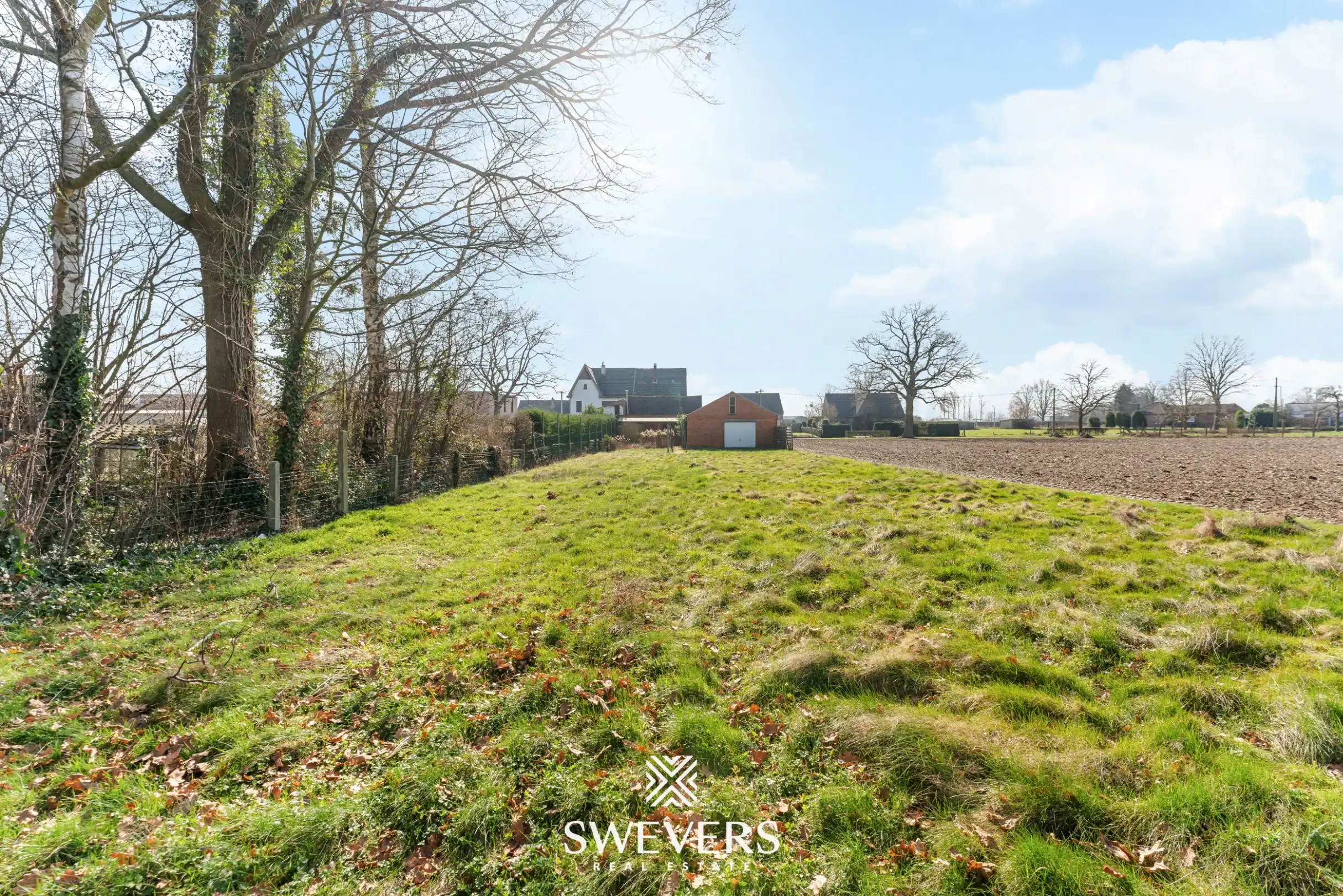 Te renoveren woning met 4 slaapkamers, grote tuin en omliggende velden op rustige ligging nabij centrum Diepenbeek foto 34