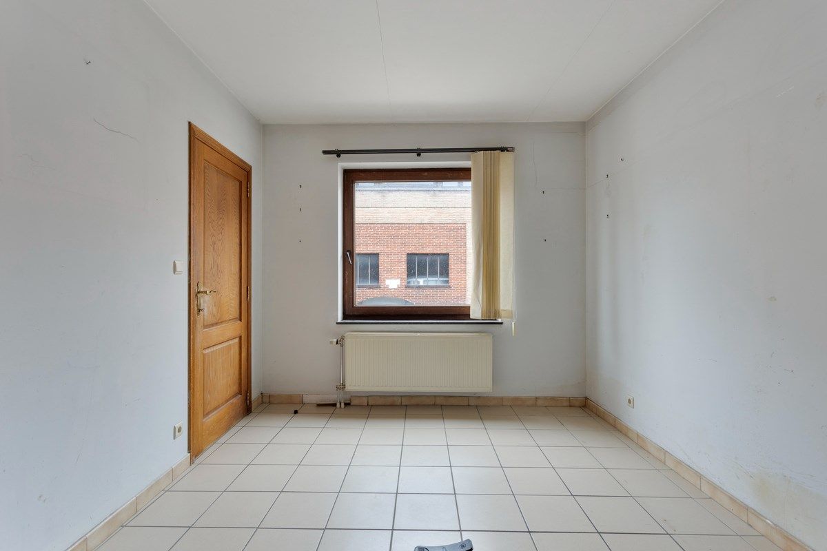 Grote woning in Tongeren centrum met ruimte voor burelen of praktijk foto 11