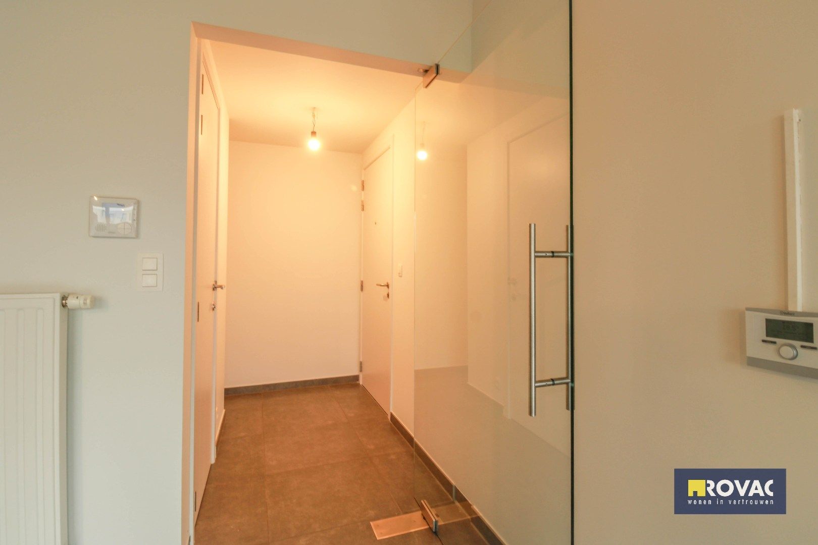 Gelijkvloers appartement met tuin en garage! foto 2