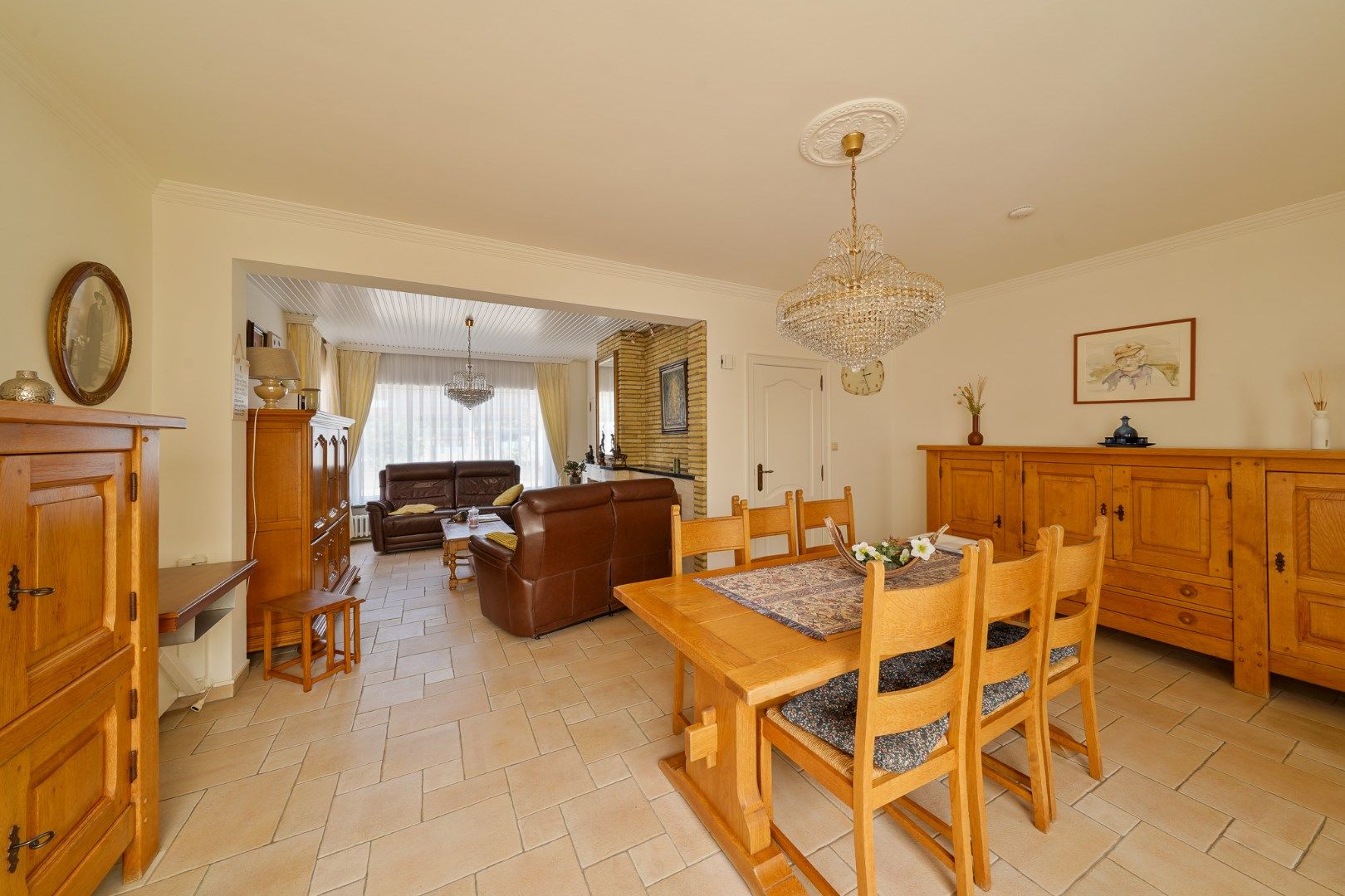 Halfopen woning met garage en zonnig terras te Mariakerke foto 5