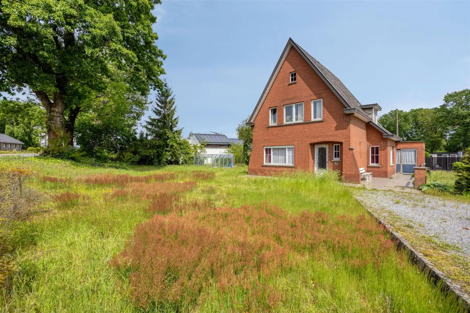 TE KOOP: Te renoveren woning met ruim perceel en projectmogelijkheden in Lummen! foto 22