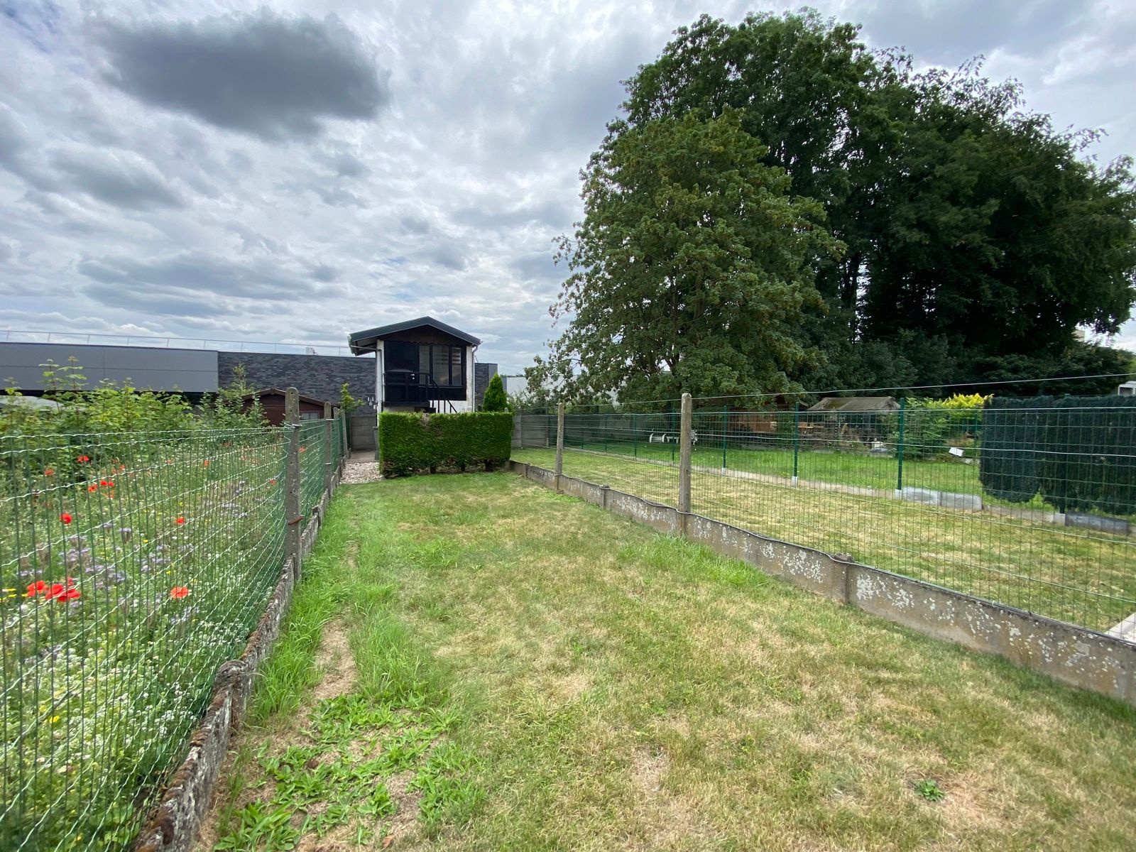 Mooie woning met tuin met 3 slaapkamers foto 3