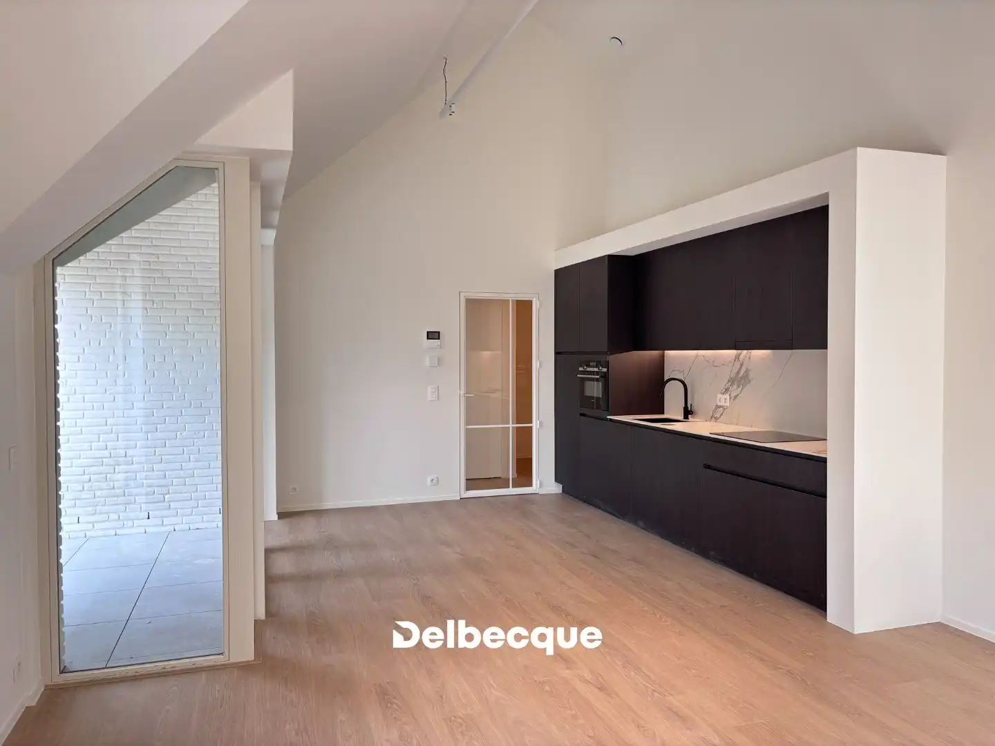  Luxueus nieuwbouwappartement in hartje Brugge met terras, parking en zicht op de godshuisjes. foto 3