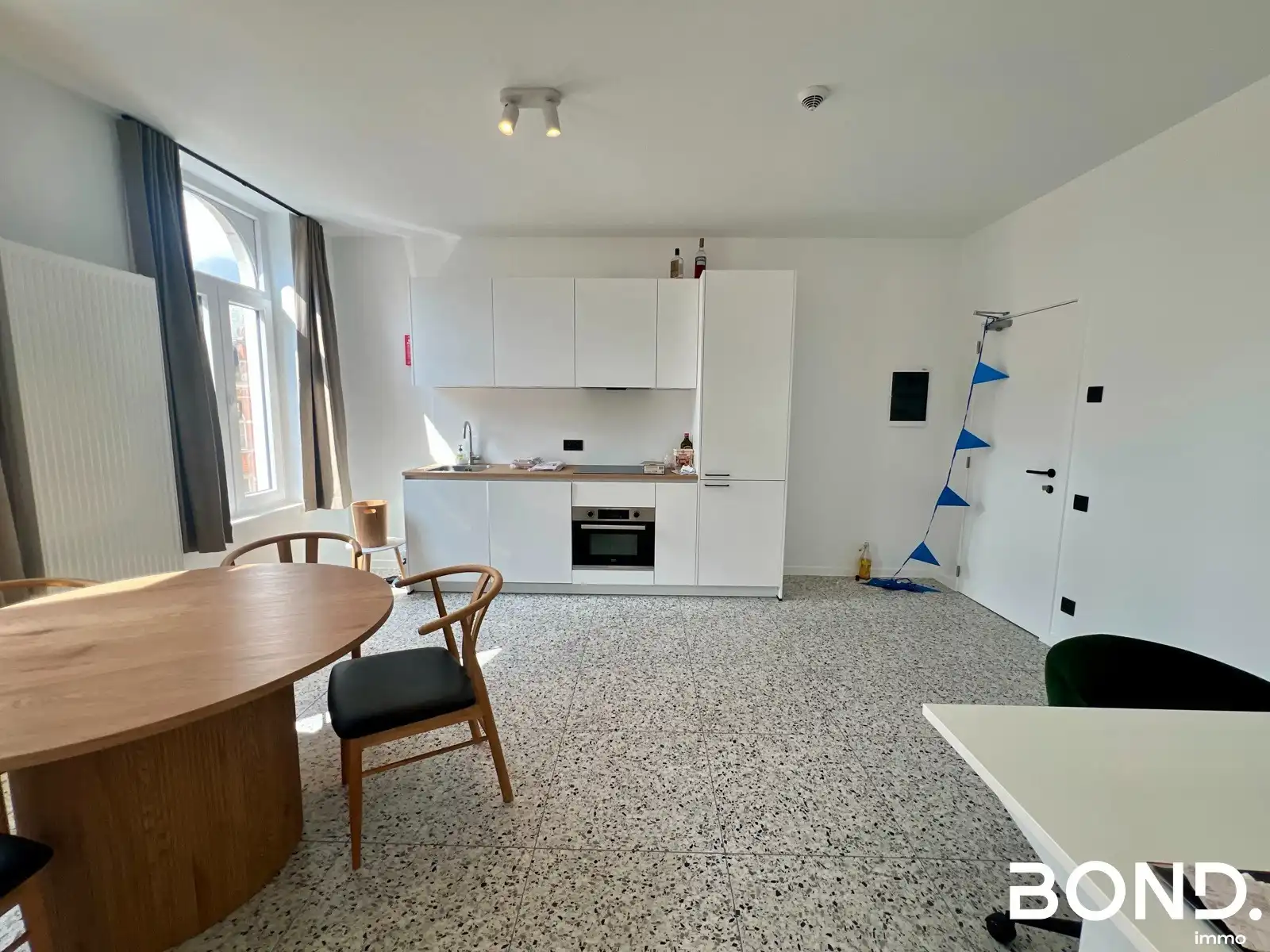 Gerenoveerd twee-slaapkamer studentenappartement te huur in hartje Leuven foto 2
