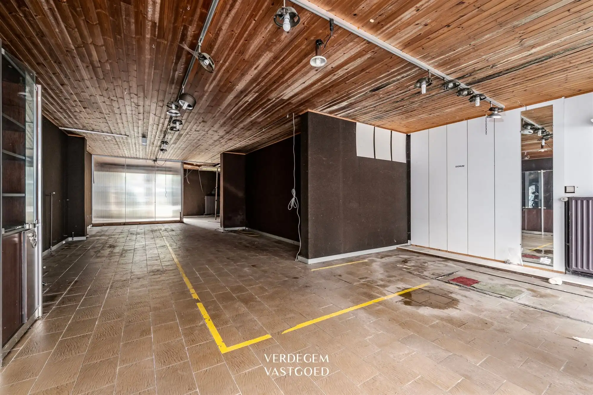 Renovatieproject: centraal gelegen handelspand met woonst en tuin foto 6