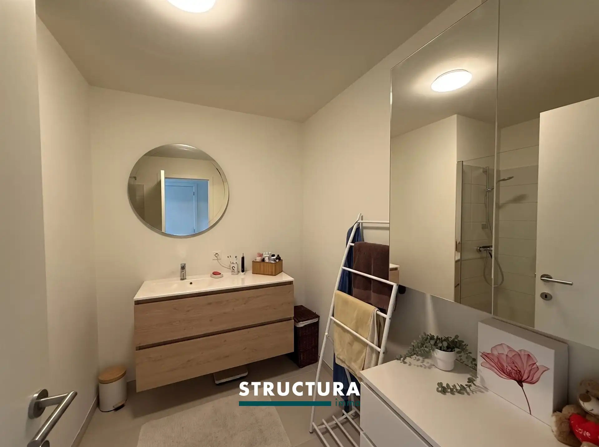Appartement met 2 slaapkamers en 2 staanplaatsen in centrum Merchtem foto 9