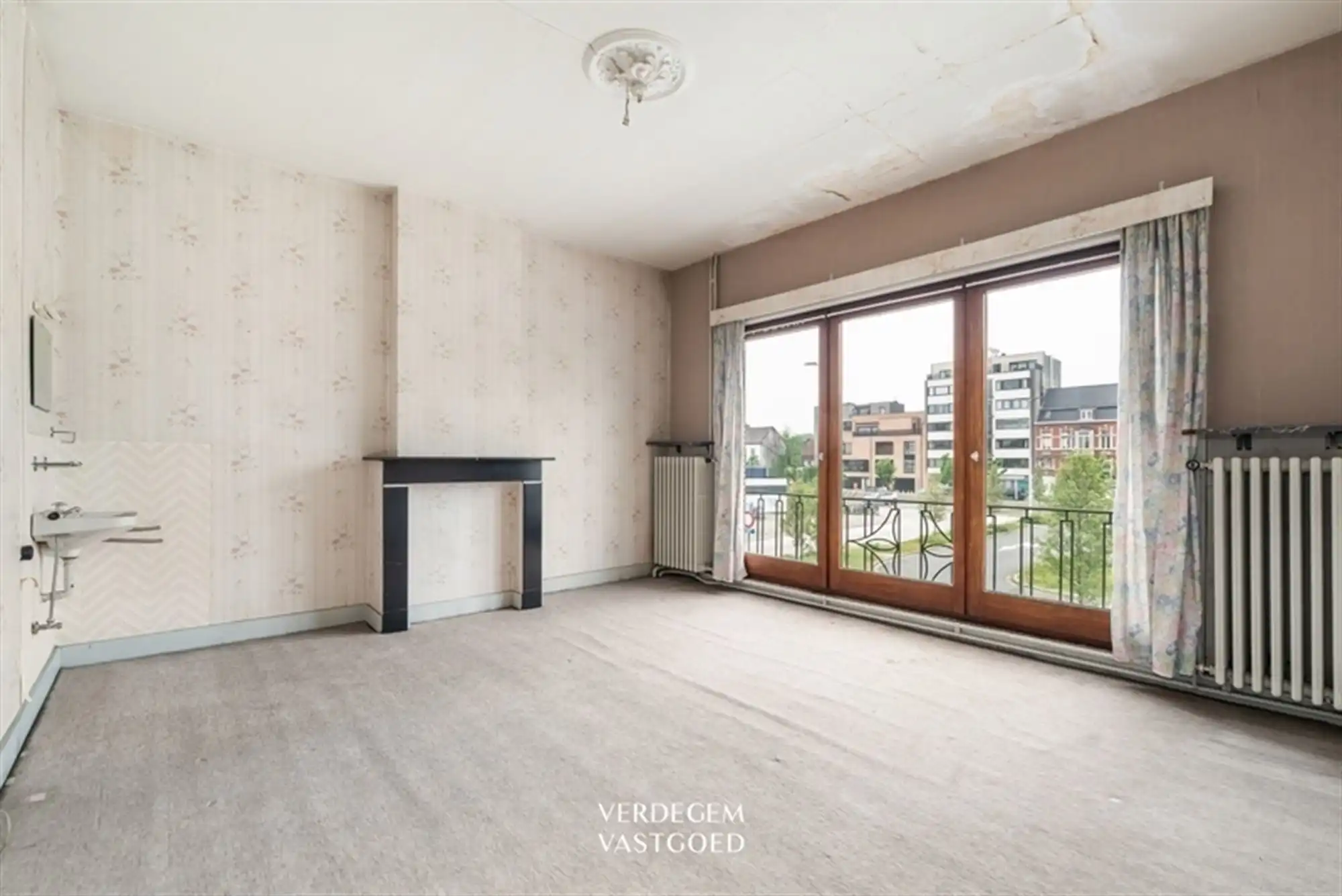 Te renoveren woning met uitzonderlijk potentieel in het centrum van Zelzate foto 13