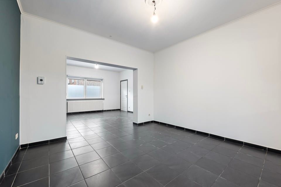 RUIME, INSTAPKLARE WONING MET 4 SLAAPKAMERS EN EEN ZONNIGE TUIN TE HEERS foto 7