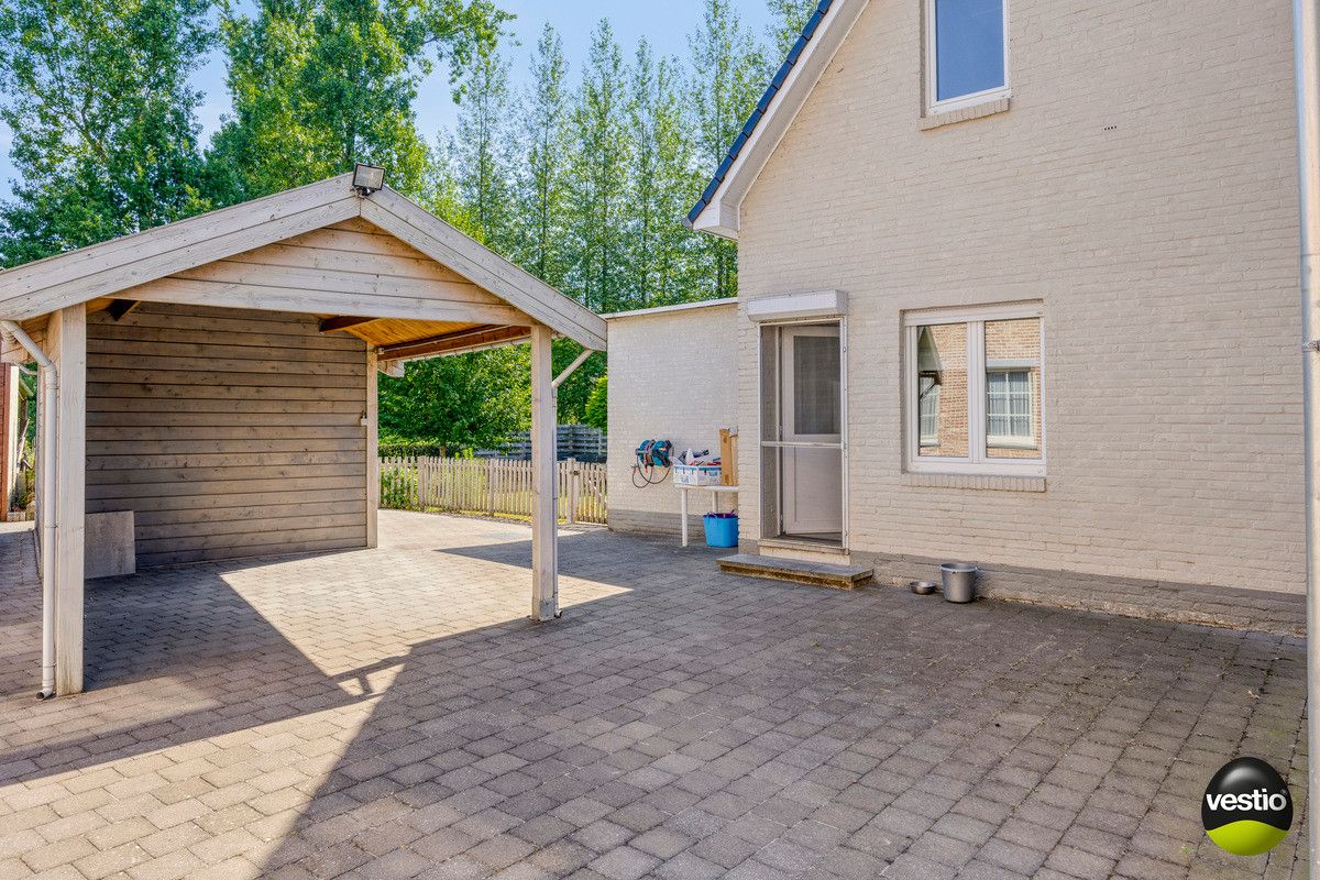 TIJDLOZE RUIME WONING MET 3 SLK OP 5A90CA NABIJ CENTRUM BEVERST. foto 24