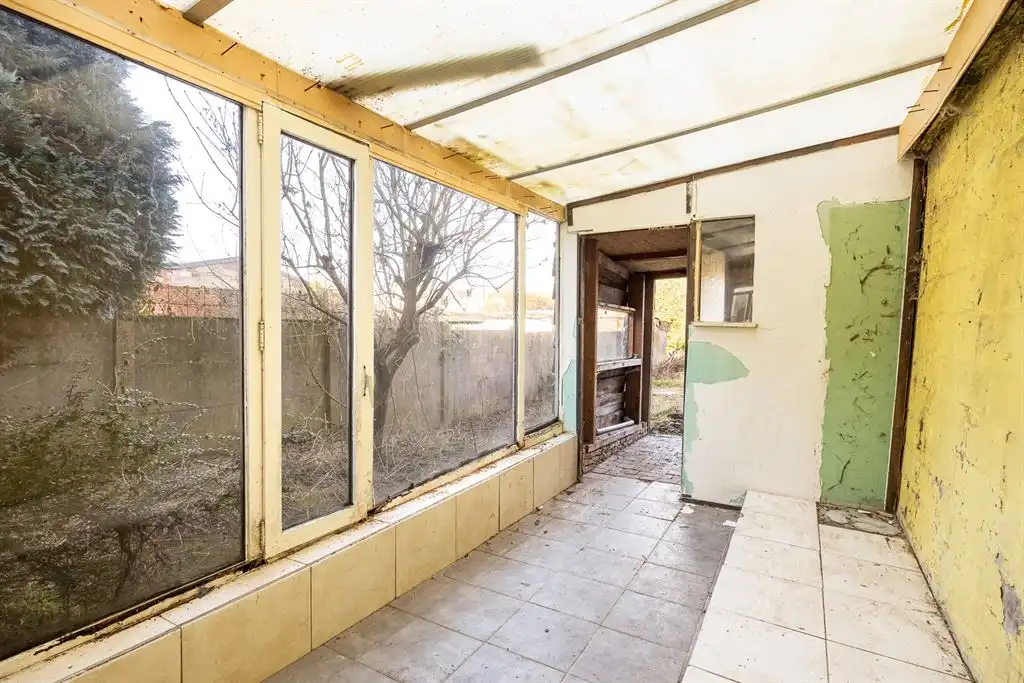 Te renoveren woning met grote tuin foto 5