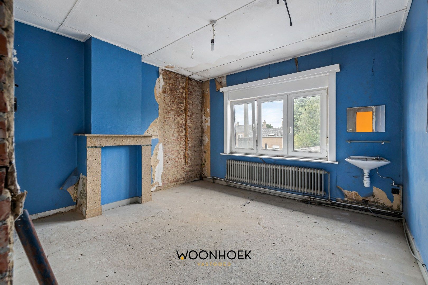 Ruime, te renoveren woning met diverse mogelijkheden foto 10