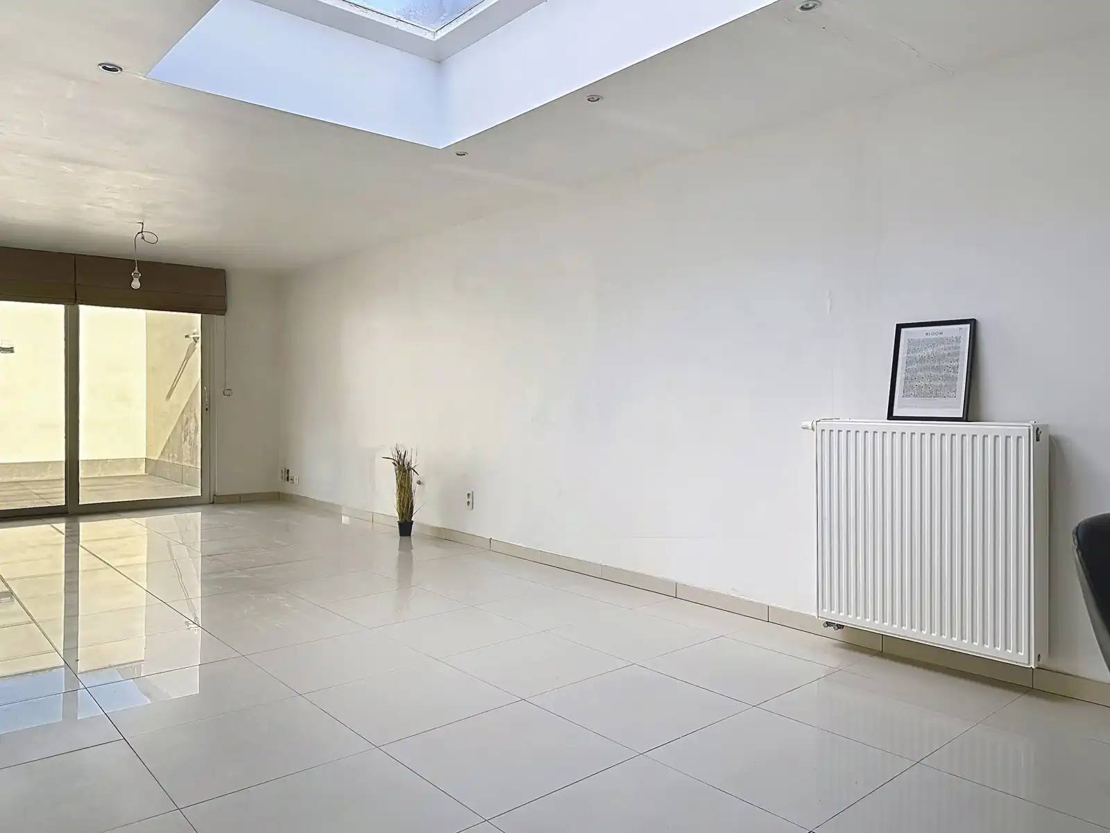 Instapklare, gerenoveerde woning met gezellige koer in hartje Niel! foto 7