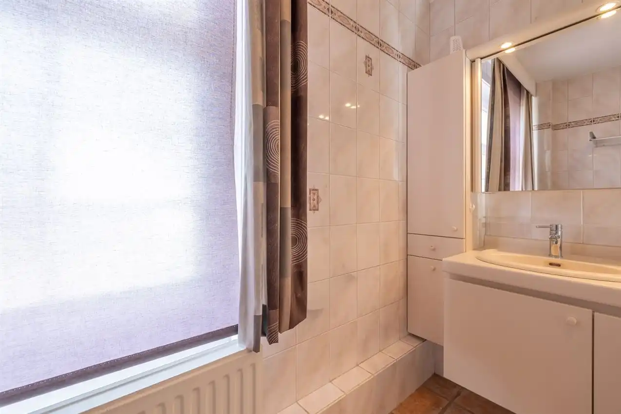 Karaktervolle en instapklare woning met zonnige tuin nabij het Gras- en Crauwelsbos foto 36