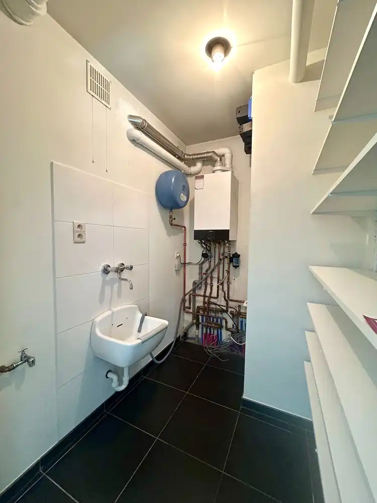Modern appartement met 2 slaapkamers en garagebox te Leuven foto 8