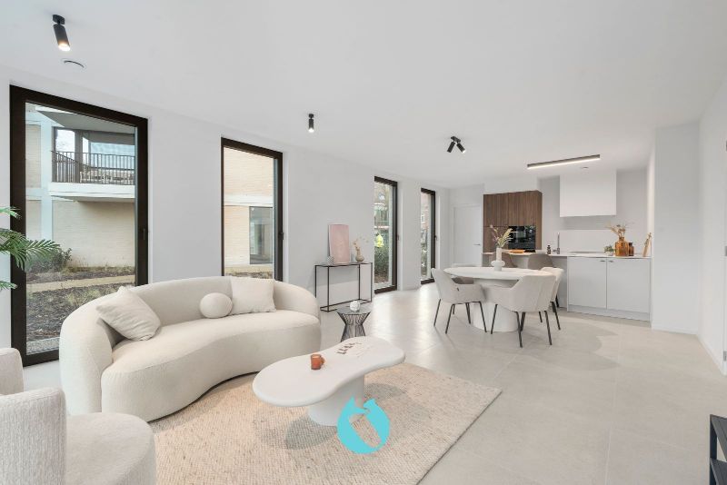 Green Square presenteert u 35 nieuwbouwappartementen en een winkelpand, letterlijk ónder de Kerktoren van Sleidinge. foto 2