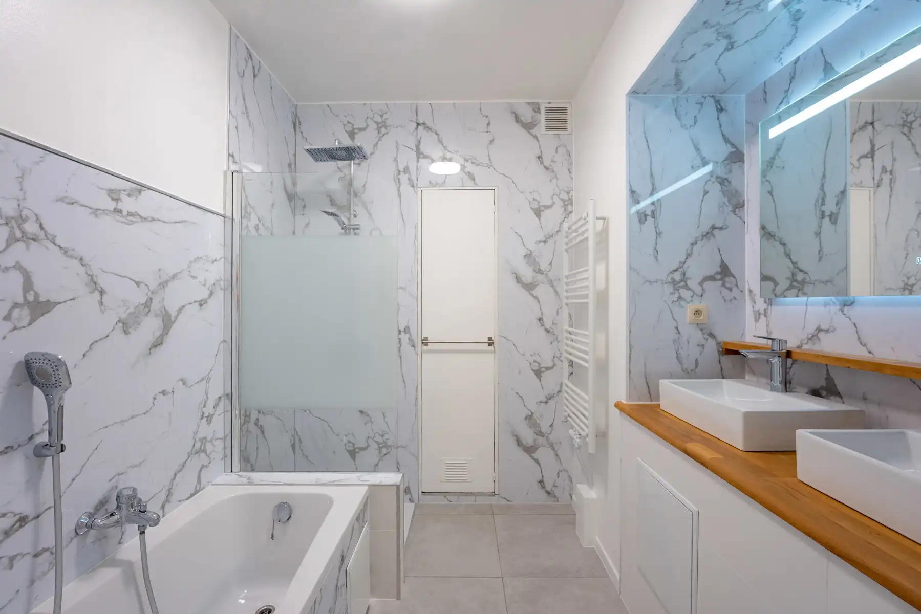 Totaal gerenoveerde duplex met 5 slaapkamers en 2 badkamers  foto 10