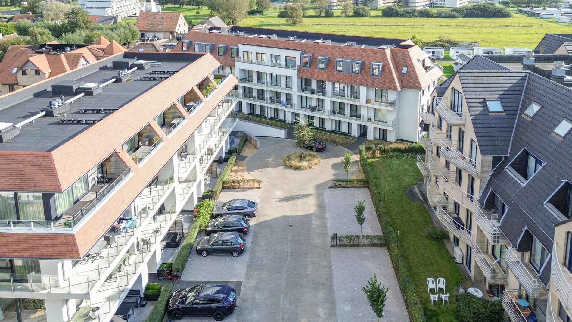 Gelijkvloers appartement met tuintje in De Haan (Vosseslag), op wandelafstand van strand en zee! foto {{pictureIndex}}