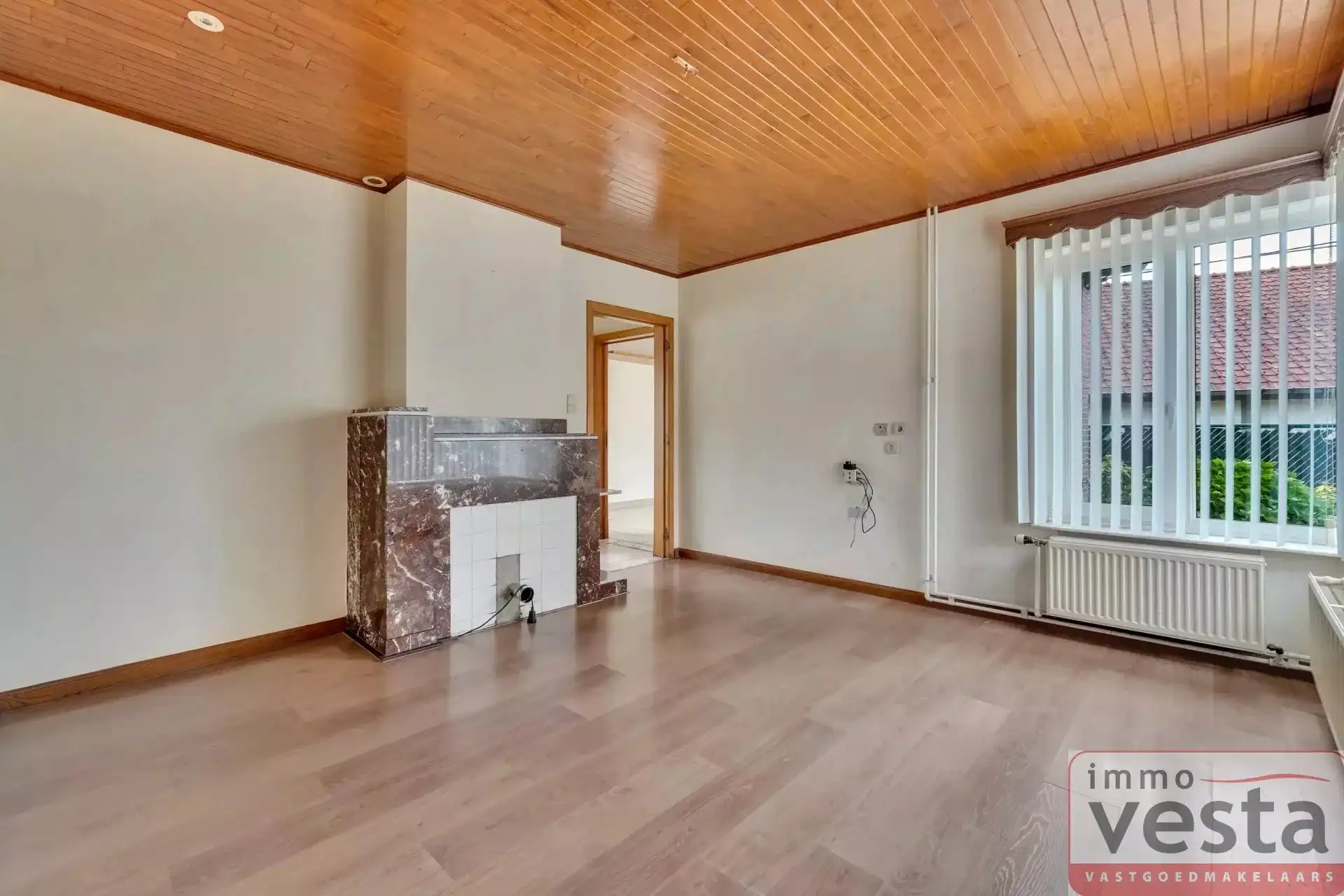 Bungalow met vier slaapkamers, inpandige garage en ruime tuin in Kortessem foto 11