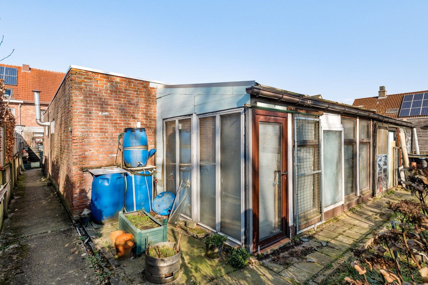 Te renoveren woning met magazijn en veel potentieel op toplocatie in Lint foto 19
