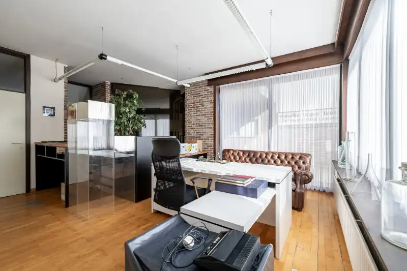 Unieke en ruime woning met geïntegreerd kantoor, 4 slpks en zuidgerichte tuin foto 5