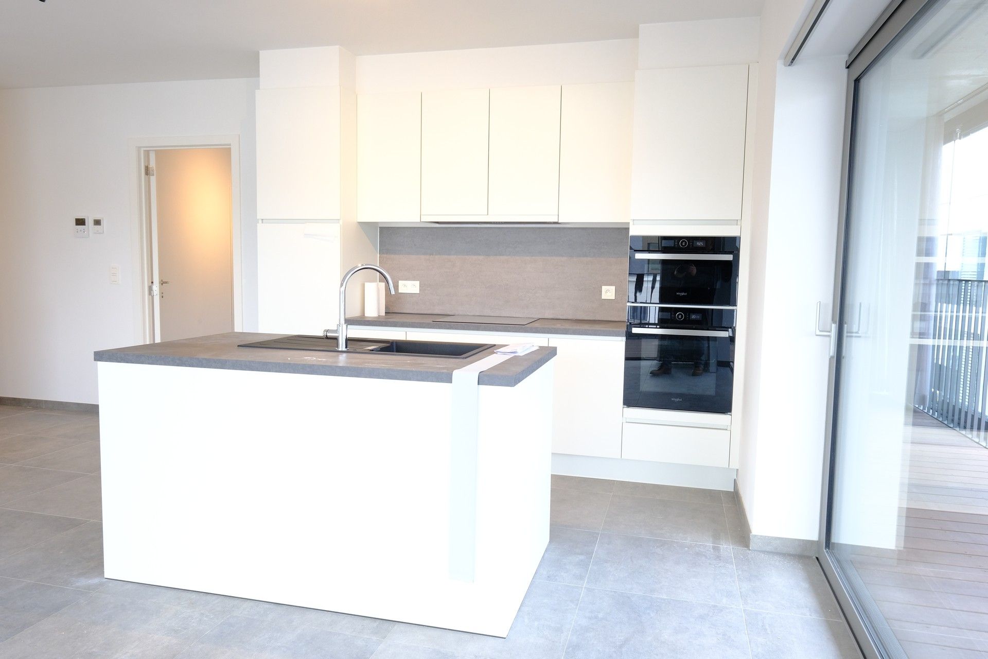 Luxueus appartement in het centrum van het bruisende Hasselt met een wintertuin van 35 m². foto {{pictureIndex}}