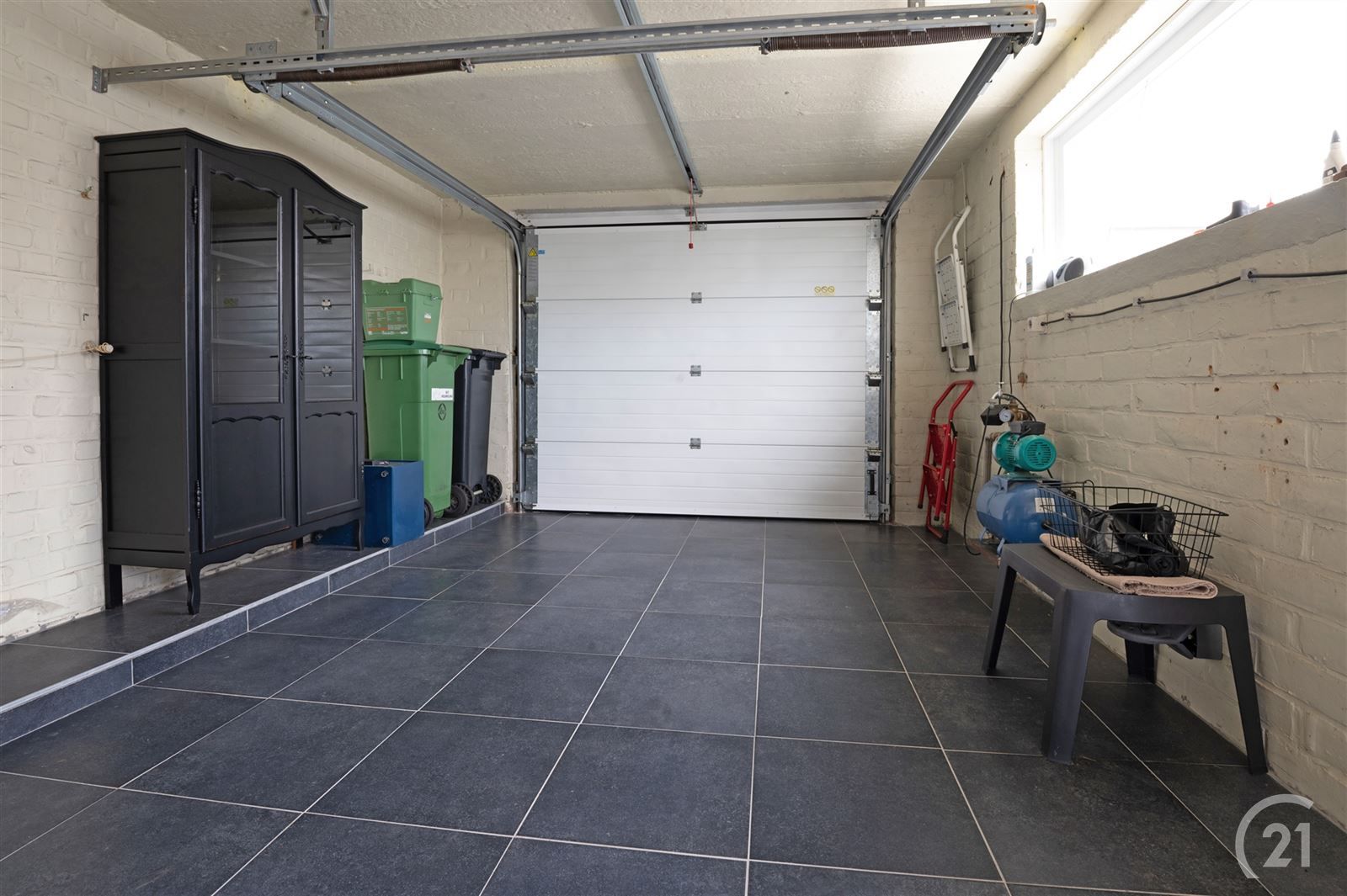Instapklare woning met zonnige tuin en vlotte bereikbaarheid foto 15