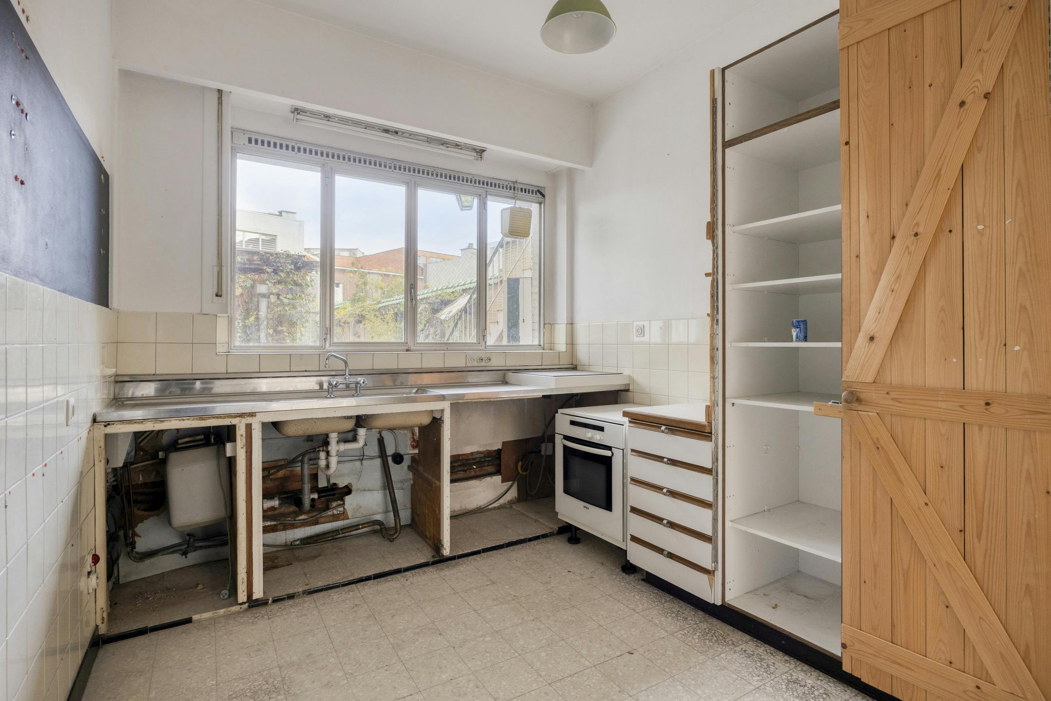 Te renoveren opbrengsteigendom met 3 appartementen en handelspand in Antwerpen foto 17