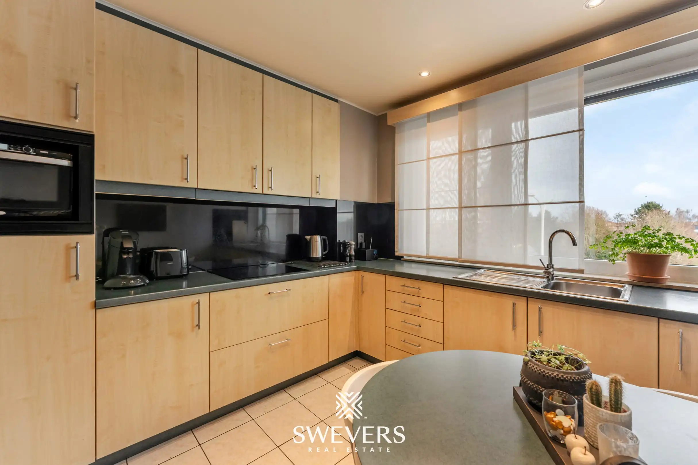 Ruim en instapklaar appartement met 2 terrassen en garage in het hart van Houthalen-Helchteren foto 8