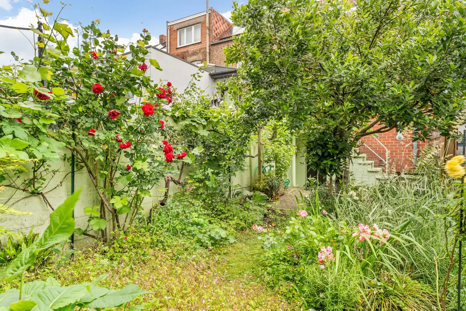 Goed gelegen en energiezuinige(B-label) woning met 3 slaapkamers en een tuin nabij het station van Leuven! foto 9