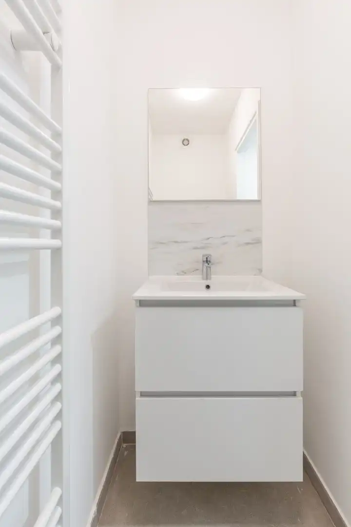 Grondig gerenoveerde woning met 3 slpks foto 8