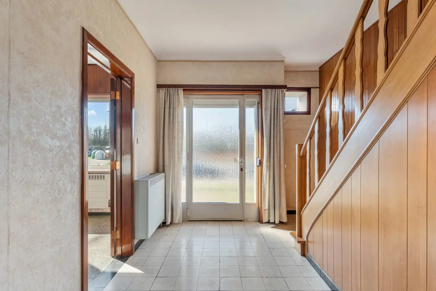 Goed gelegen en half open woning met 3 ruime slaapkamers, een extra leefruimte, een garage en een tuin te Kessel-Lo! foto 8