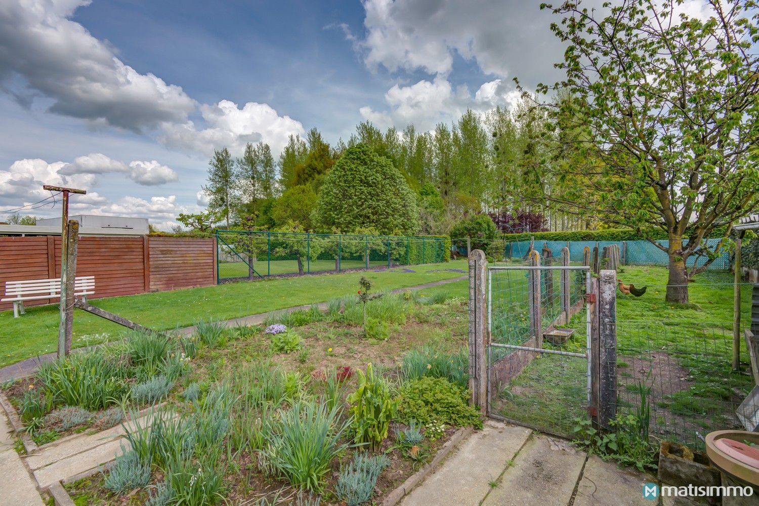 VRIJSTAANDE EENGEZINSWONING MET 3 SLAAPKAMERS, GARAGE EN UITGESTREKTE TUIN IN WELLEN foto 32