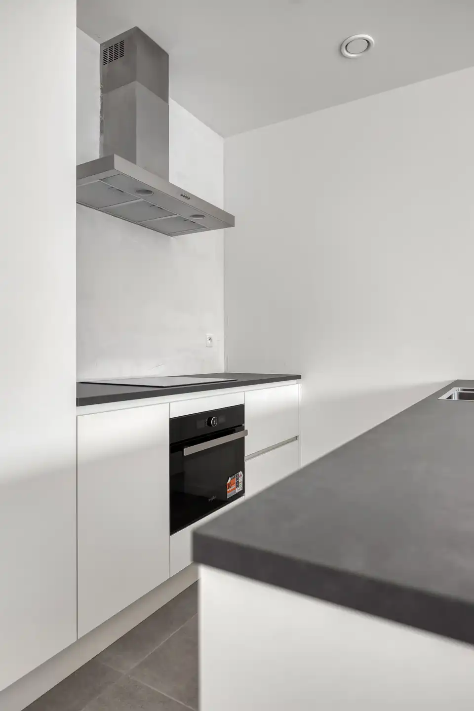 Stijlvol gelijkvloers appartement met tuin foto 10