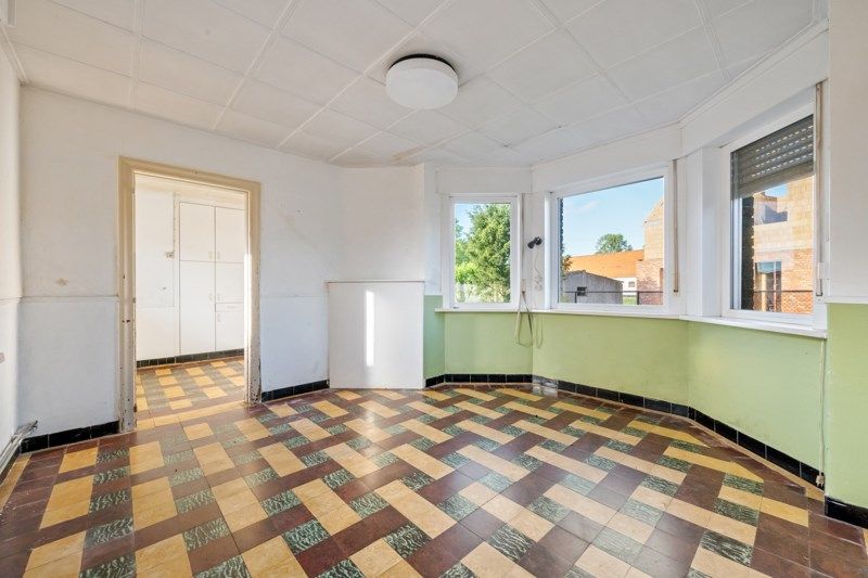 Te renoveren woning met een ruime tuin en zolder – een unieke kans! foto 5