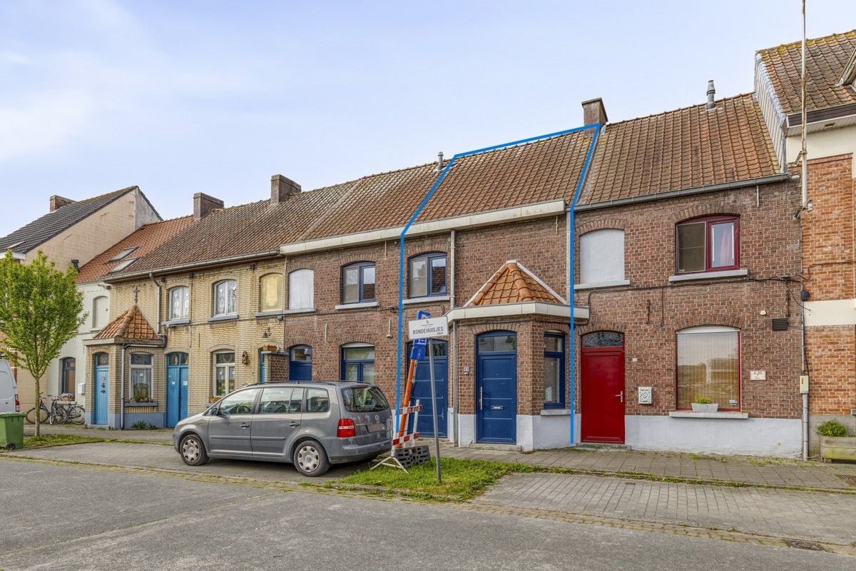 Energiezuinige woning met zonnige tuin gelegen in een residentiële straat in het centrum van Drongen. foto 15