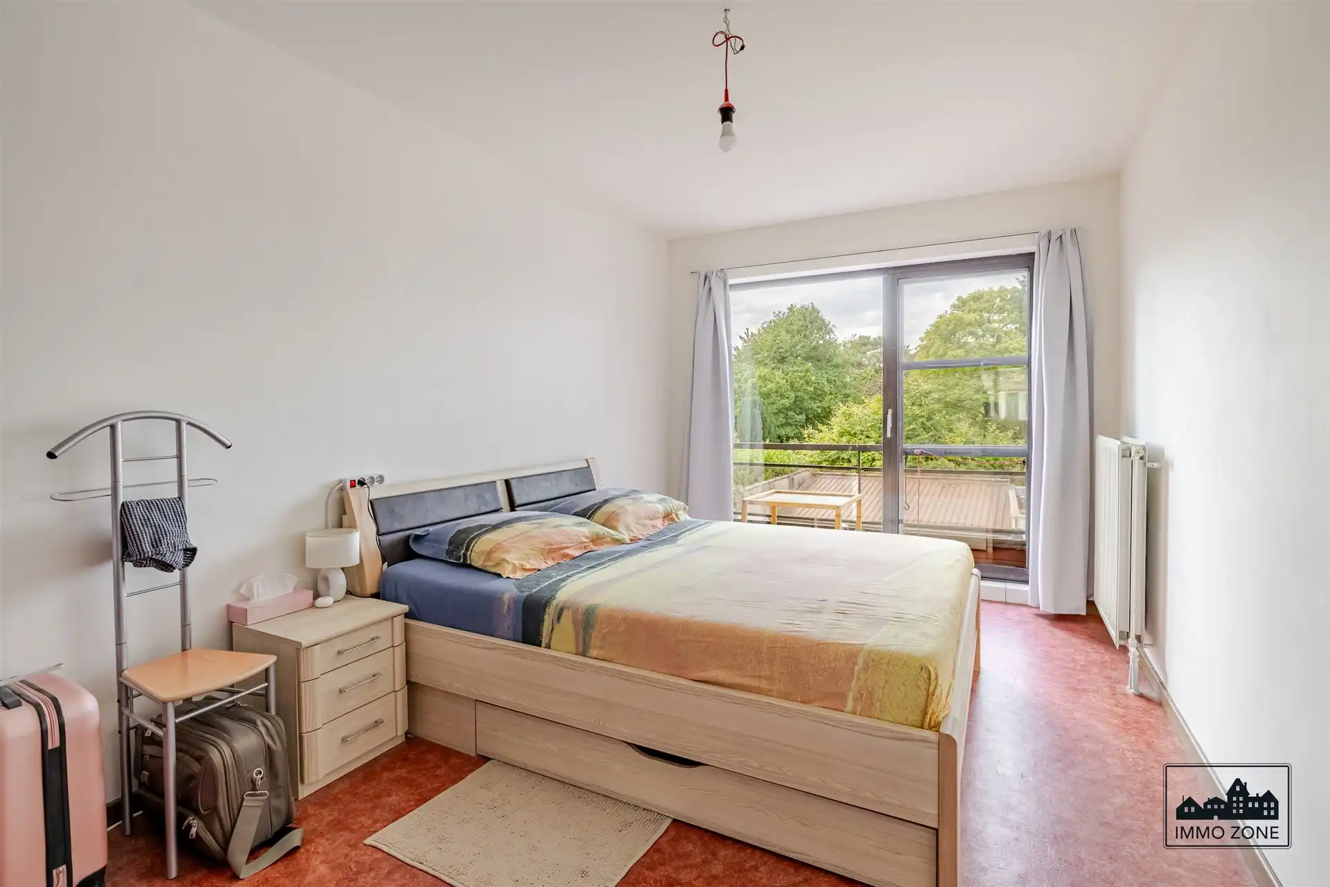 Ruim éénslaapkamerappartement te koop met terras en garage foto 6