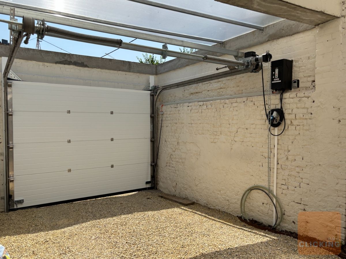 Slim wonen in stijl: volledig gerenoveerde woning in het groene Borchtlombeek foto 14