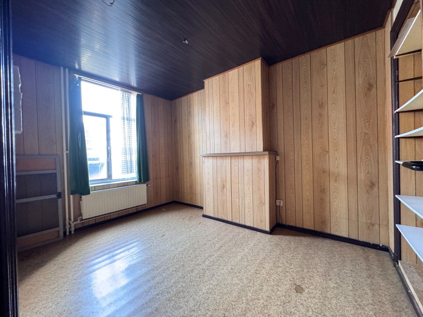 Zeer ruime te renoveren rijwoning met 4 bouwlagen.  foto 13