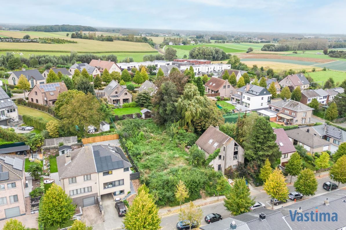 Bouwklare grond voor open bebouwing nabij centrum Asse foto 1