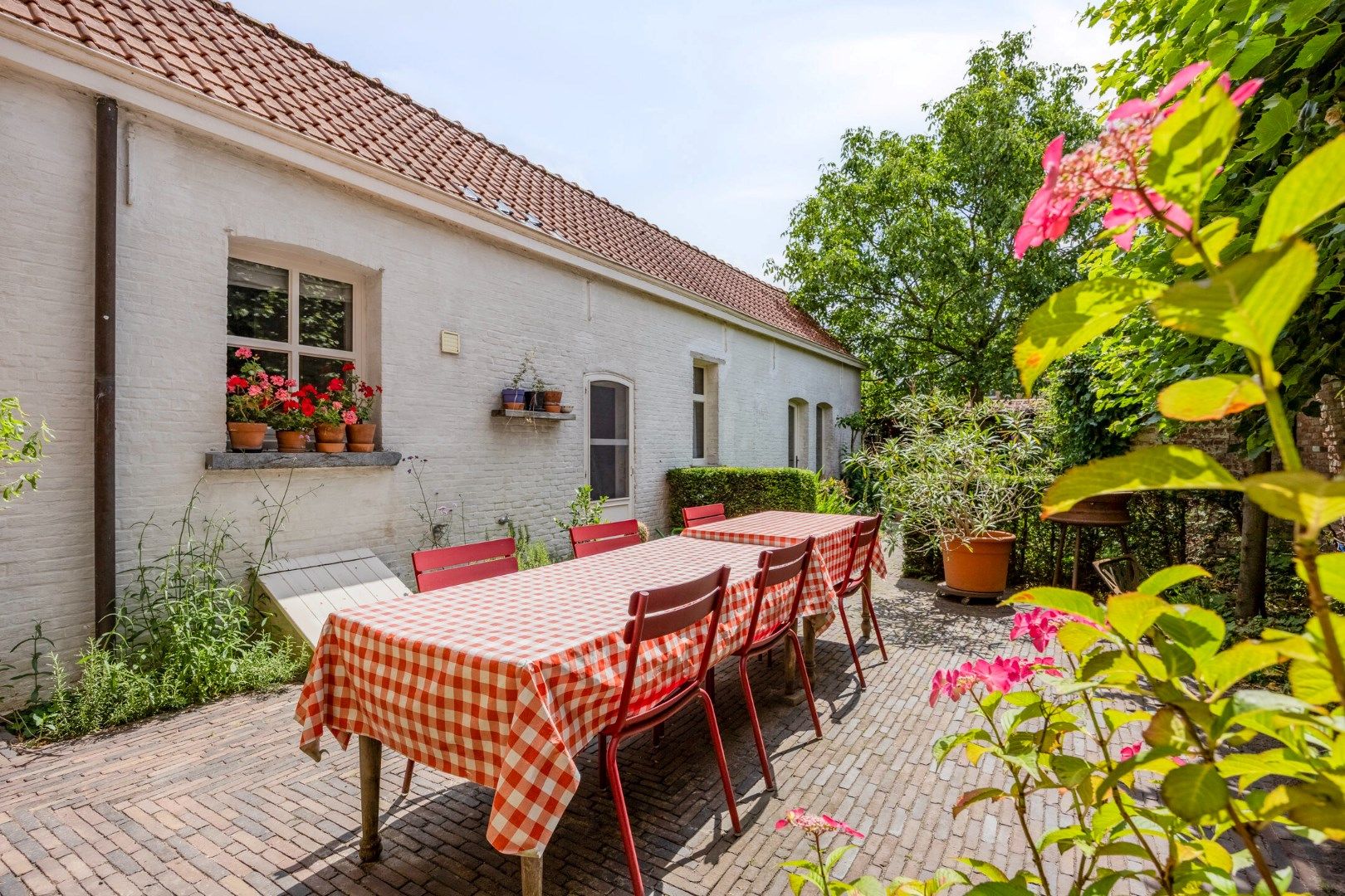 Instapklaar herenhuis met 4/5 slpks, centraal gelegen in Achterbos !  foto 32