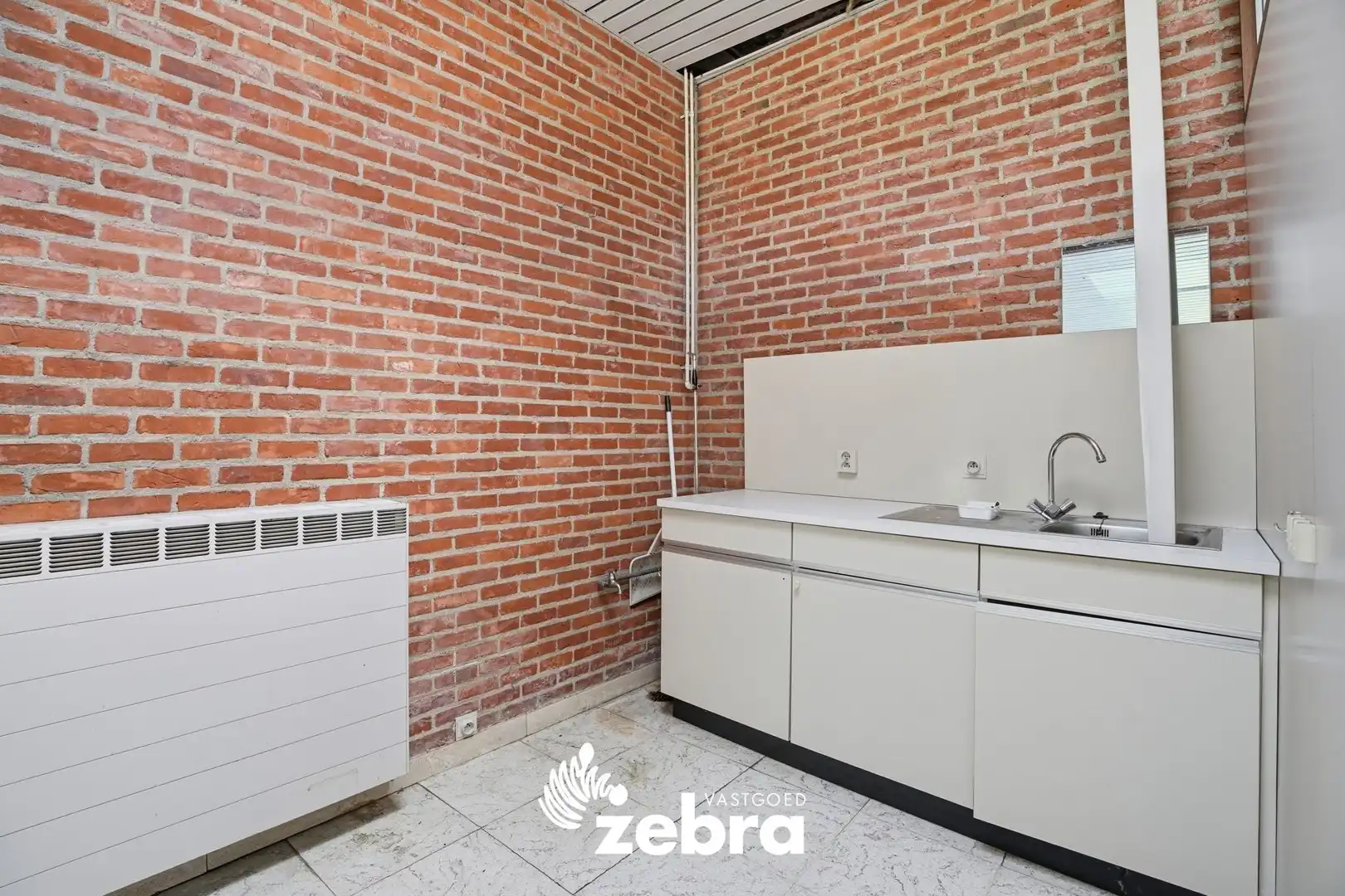 Veelzijdig handelspand met parkeerplaatsen op topligging in centrum Tielt! foto 15