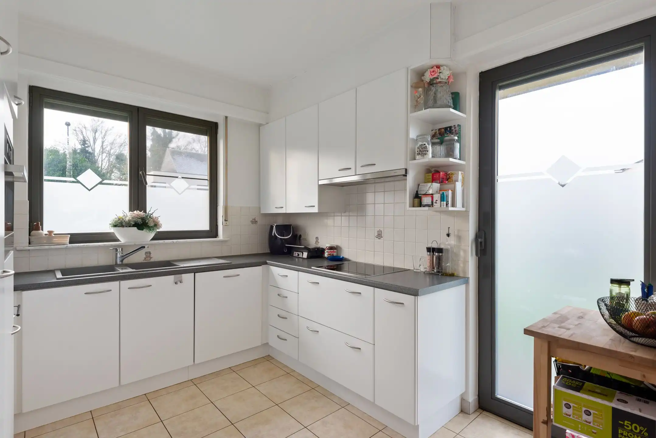 Opbrengsteigendom met 3 appartementen + garageboxen in Wommelgem te koop! foto 6