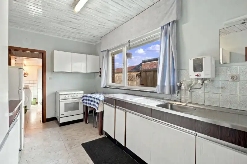 Rijwoning met tuin foto 10