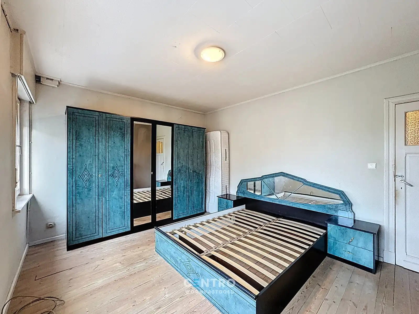 Op te frissen woning met 4 slpks én ZUIDger. tuin te Assebroek! foto 12