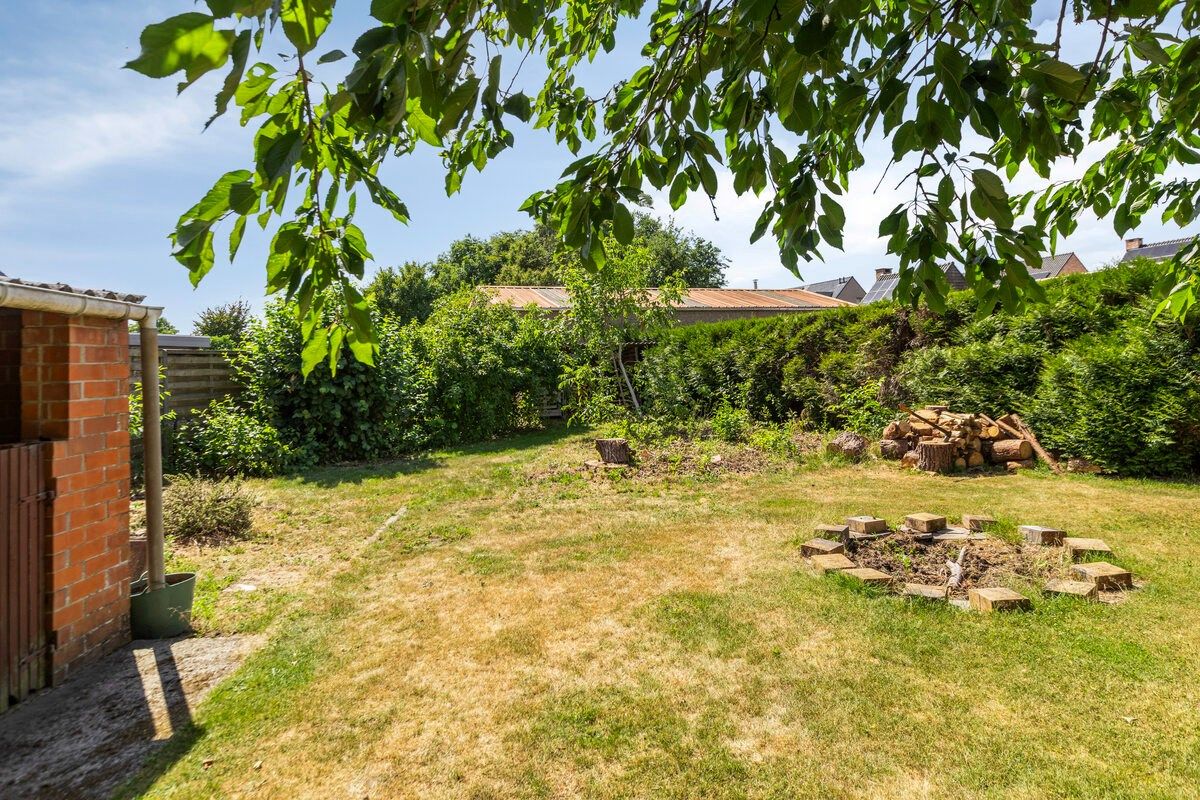 Rustig gelegen gelijkvloers woning met 2 slpks en ruime zolder. foto 19