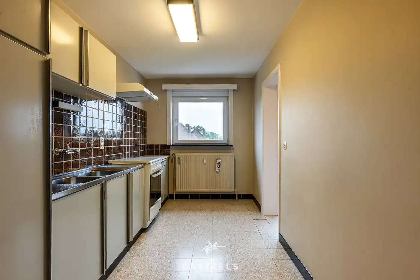 Ruim, te renoveren EPC B appartement met twee slpkmrs te Gent foto 6