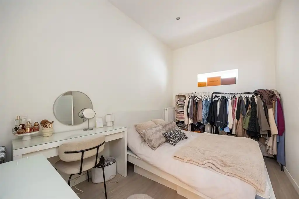 Instapklaar gelijkvloers appartement met stadskoer foto 7