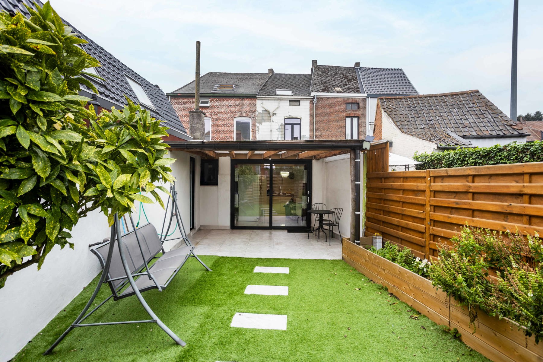 Gerenoveerde stadswoning met tuin en 3 SLP foto 23
