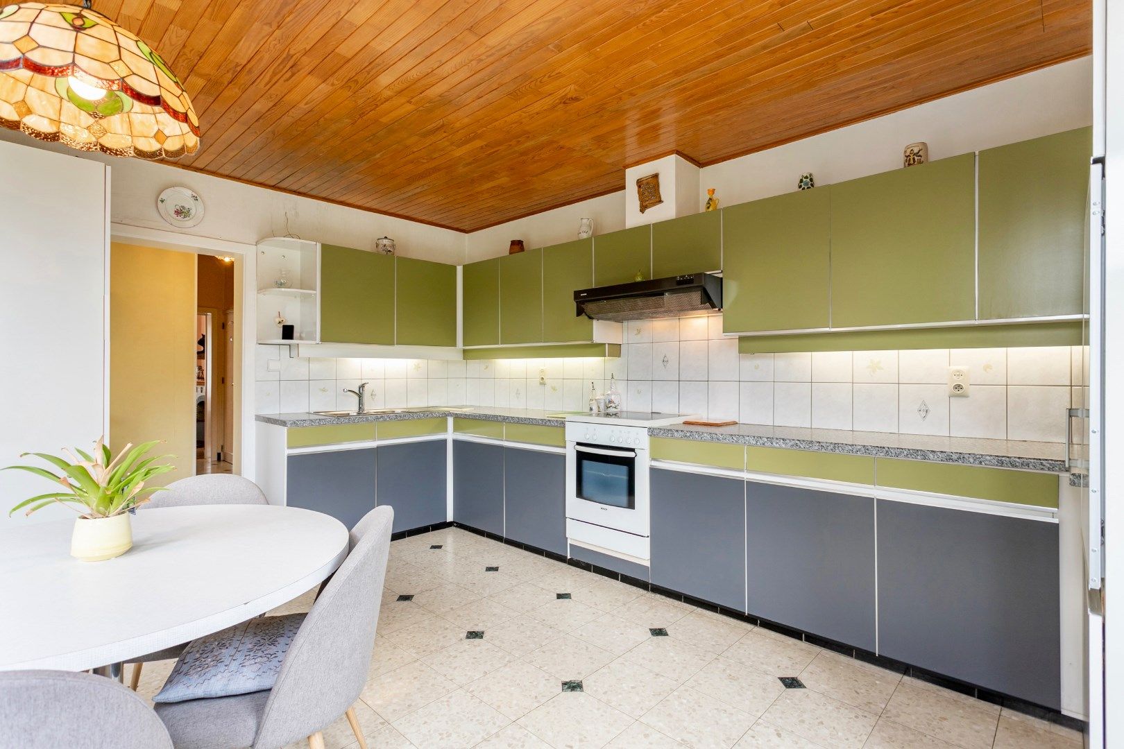 Woning met 2 (mogelijk 3) slpk. , tuin en inpandige garage foto 7