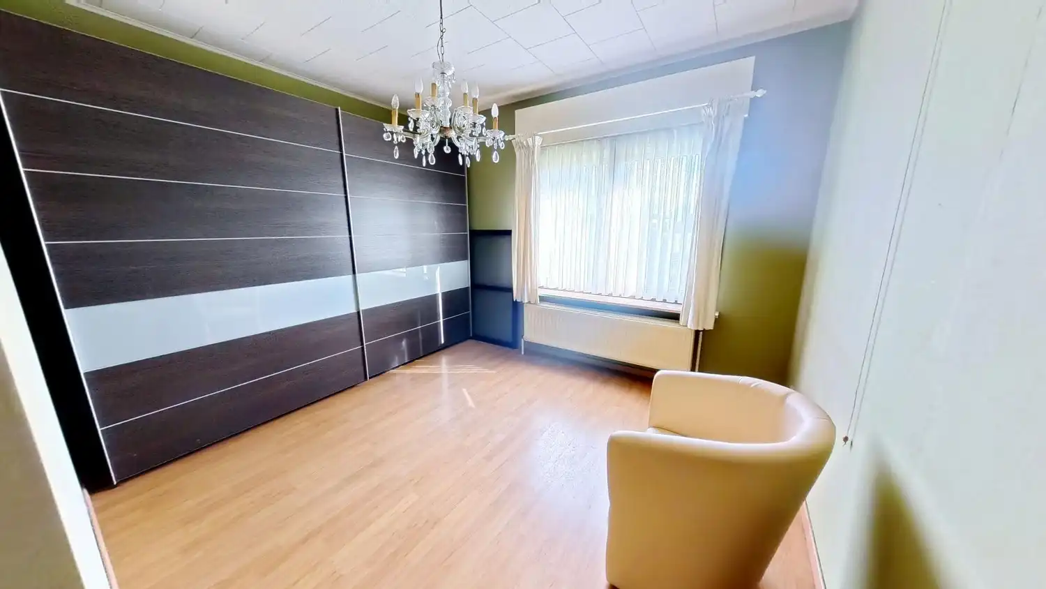 Centraal gelegen woning met 3 slaapkamers en mooie tuin! foto 9